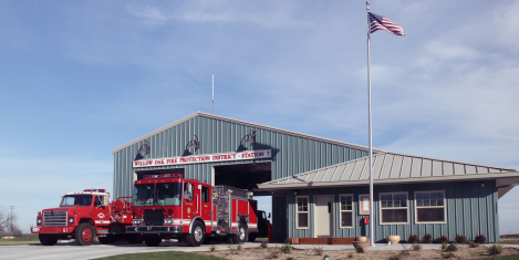 Outside view of fire station and trucks