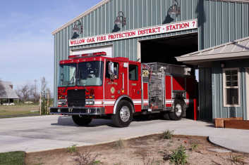 Outside view of fire station and trucks