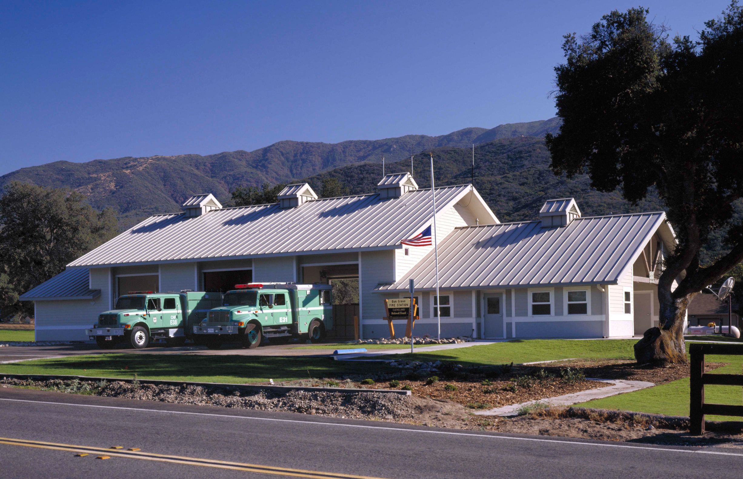 Outside view of fire station and trucks